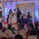 Multilingual MC Reena hosts Catholic Wedding reception